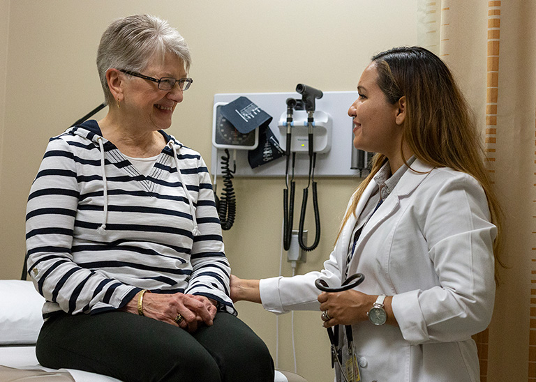 Nurse with an elderly patient