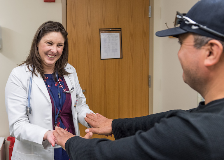Nurse practitioner with a pregnant patient