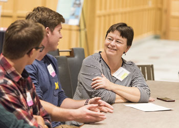 Michelle Pardee talking with students