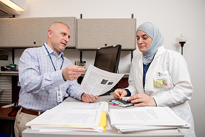 Sculli and Cherara (right) collaborating at NCPS