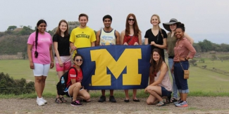 Nursing and LSA students display the M flag at Monte Alban Nursing and LSA students display the M flag at Monte Alban