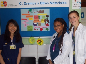 Students prepare a poster on nutrition for a patient education session in Ecuador