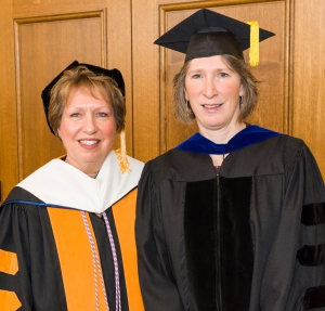 Dean Potempa and Dr. Smith on graduation before Dr. Smith recieved her Teacher 