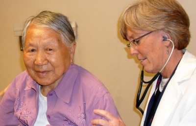 Dr. Brush with a patient at Hope Clinic