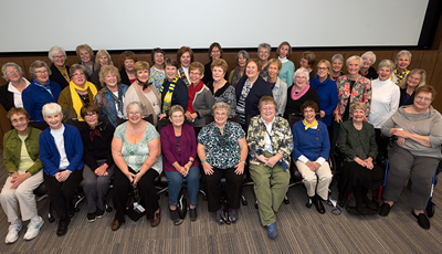 Photo of the class of 1966 at a more recent gathering