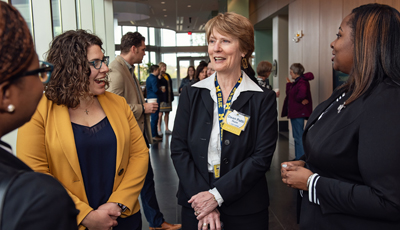 Dean speaking with Faculty