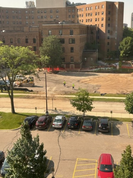 View of the M64 parking lot with grass and topsoil stripped away
