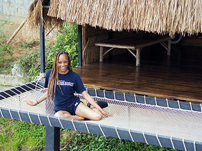 Lindsey wearing her Blavin Scholars shirt in Thailand