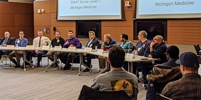 People sitting in a round table discussion