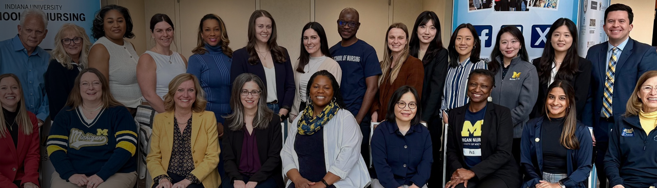 Large group of University of Michigan researchers and faculty posing together at the MNRS Research Conference 