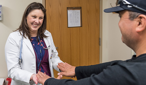 Nurse examines patient 