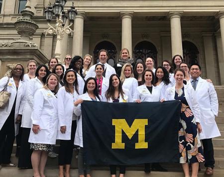 Matsumoto with U-M students, graduates and practitioners at the state capitol for Advocacy Day